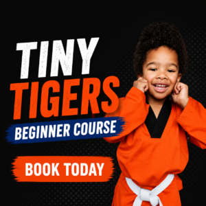 Tiny Tigers Martial Arts Child aged 4-7 wearing orange uniform